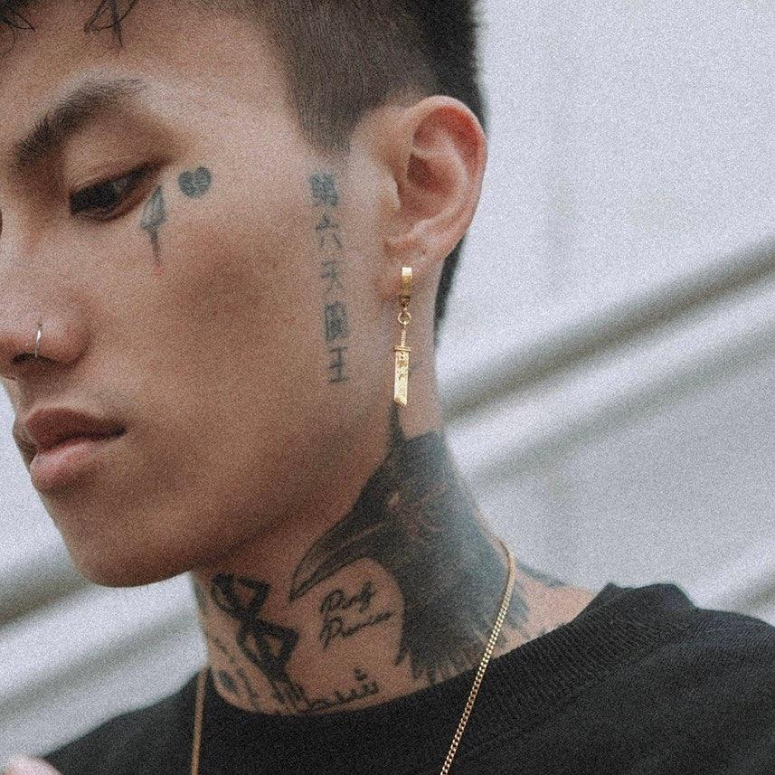 The Mister Buster Earring in...
